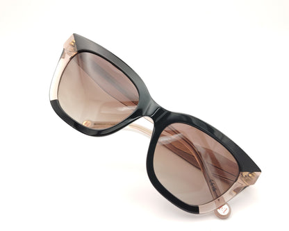 gafas de sol carolina herrera cat eye negras y nude translúcidas con lentes degradadas marrones
