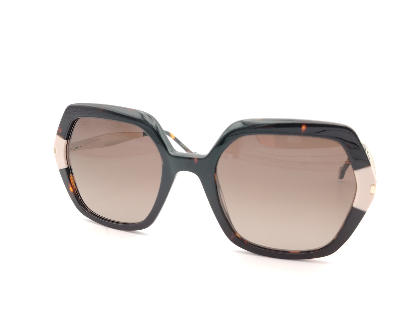 gafas de sol carolina herrera oversize geométricas carey con detalles nude y varillas doradas