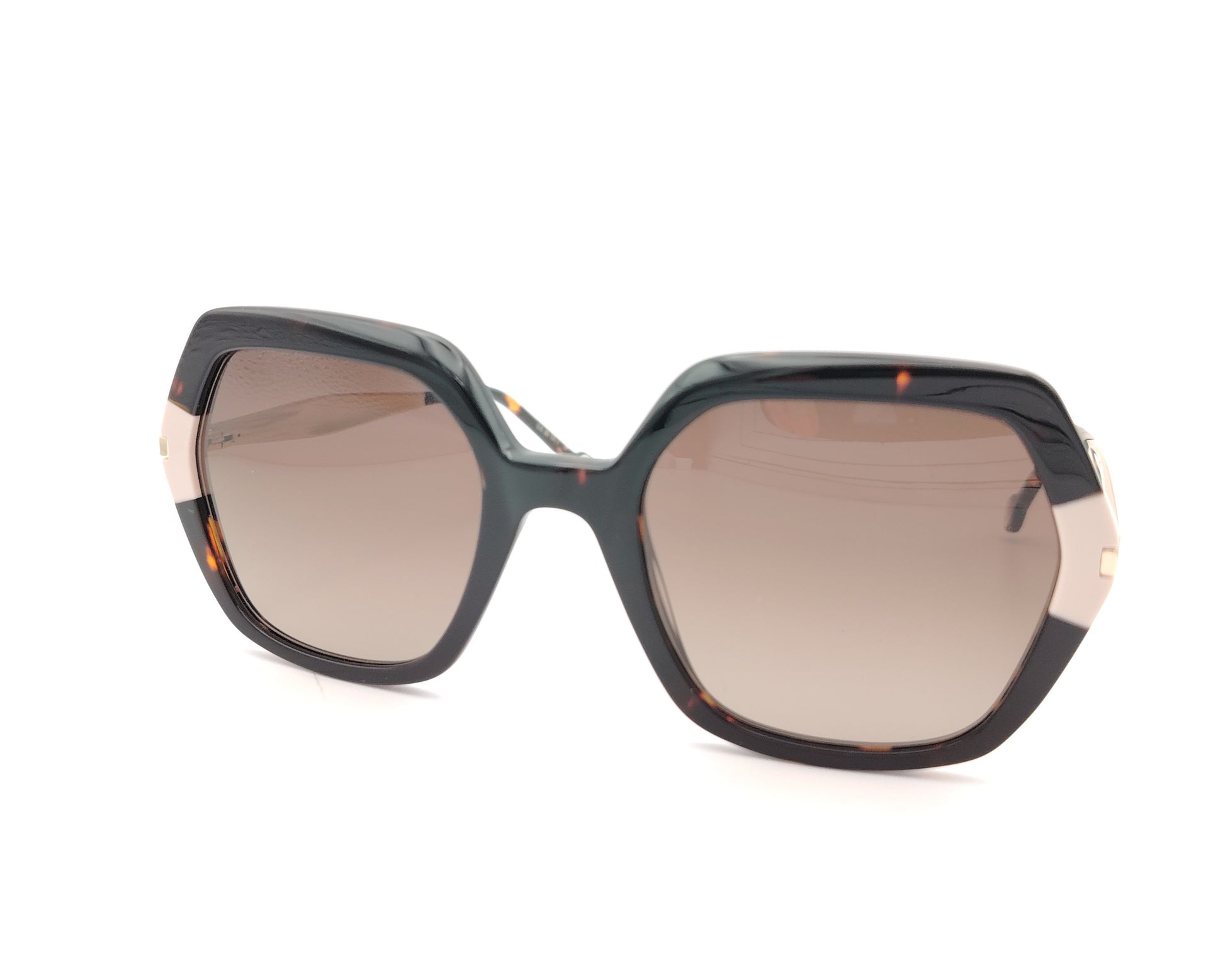 gafas de sol carolina herrera oversize geométricas carey con detalles nude y varillas doradas