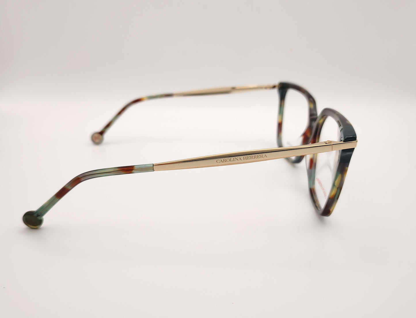 gafas graduadas carolina herrera de forma cuadrada en acetato multicolor con varillas metálicas doradas