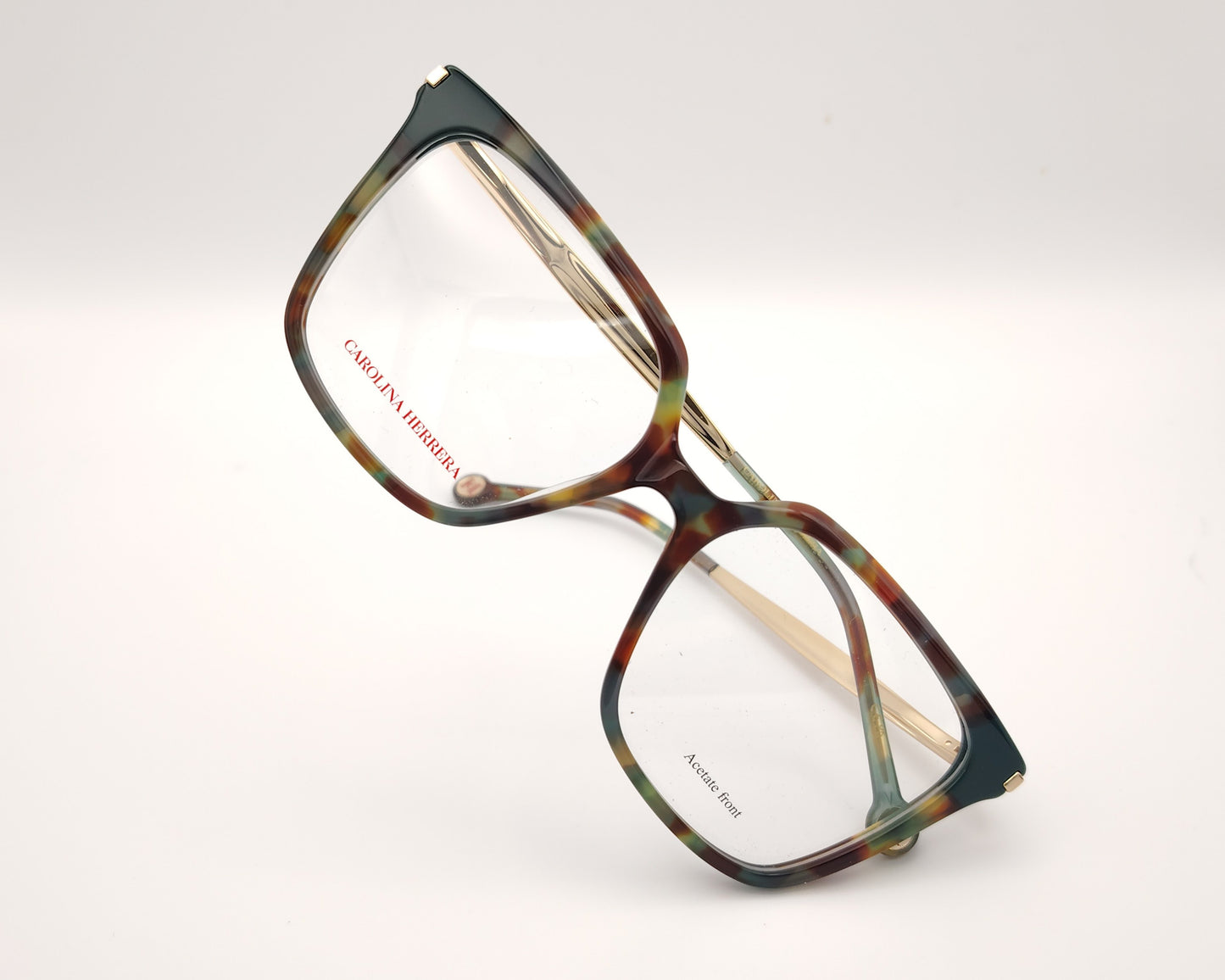 gafas graduadas carolina herrera de forma cuadrada en acetato multicolor con varillas metálicas doradas