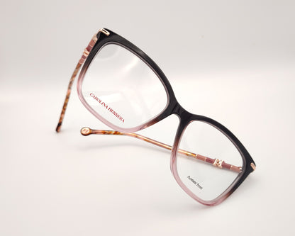 gafas carolina herrera  con degradado de berenjena a rosa y varillas finas doradas con detalles carey 