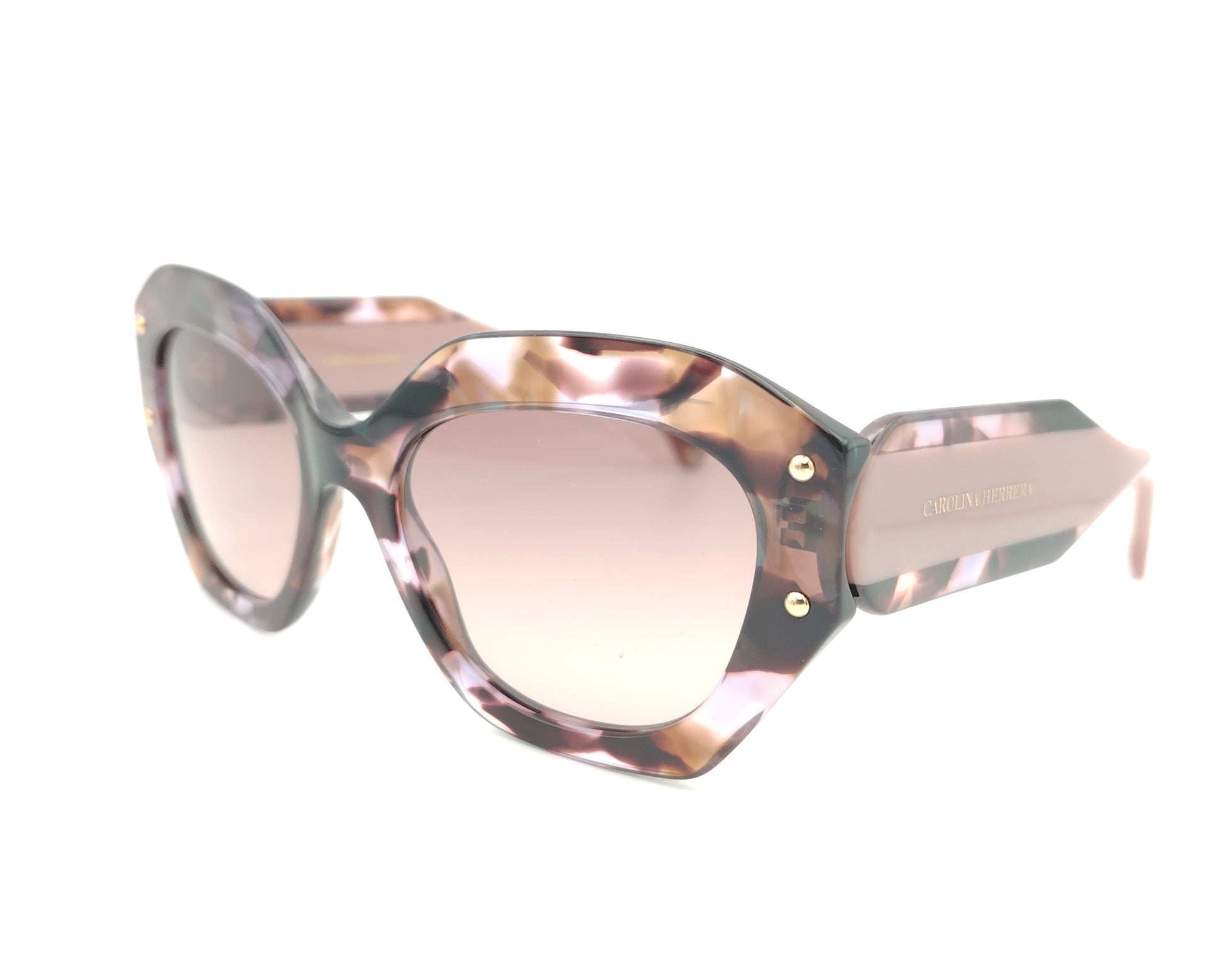 gafas de sol carolina herrera marmoladas en tonos rosa malva y carey con forma oversize