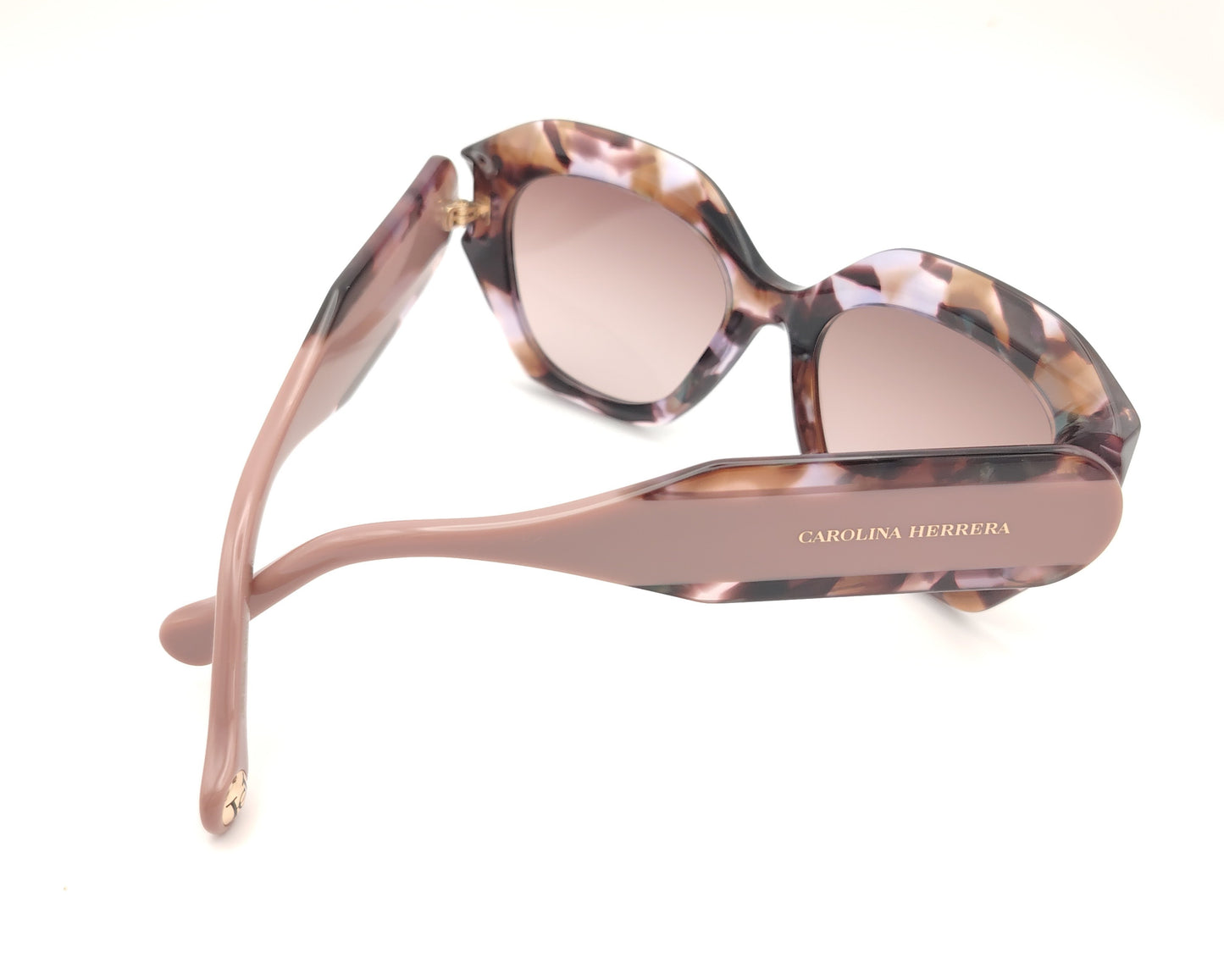 gafas de sol carolina herrera marmoladas en tonos rosa malva y carey con forma oversize
