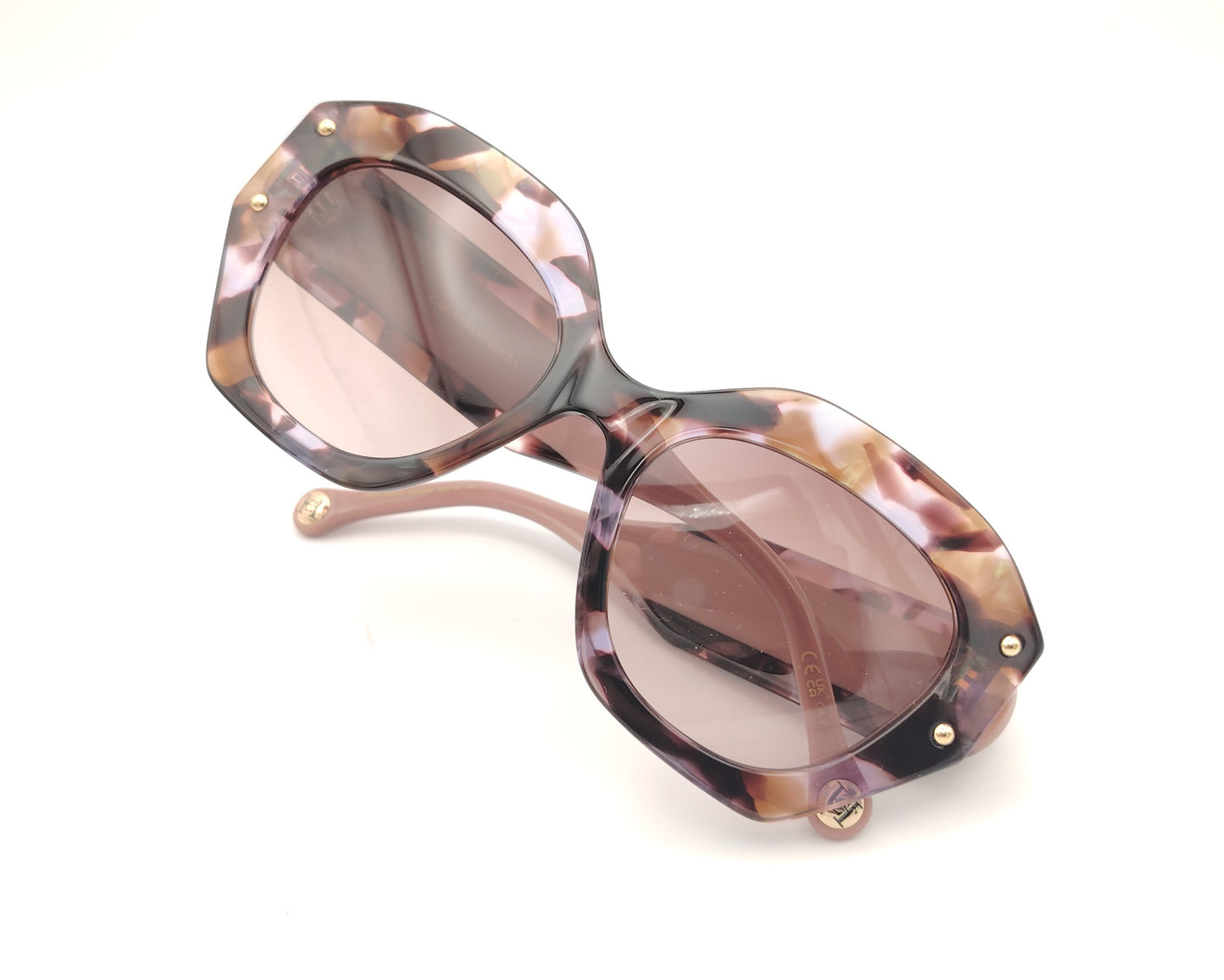 gafas de sol carolina herrera marmoladas en tonos rosa malva y carey con forma oversize