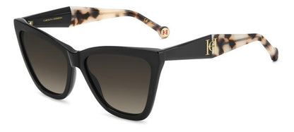 gafas de sol carolina herrera cat eyes negras oversize con varillas carey y lentes degradadas marrones