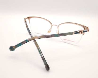 gafas de metal semi al aire carolina herrera en color verde y dorado