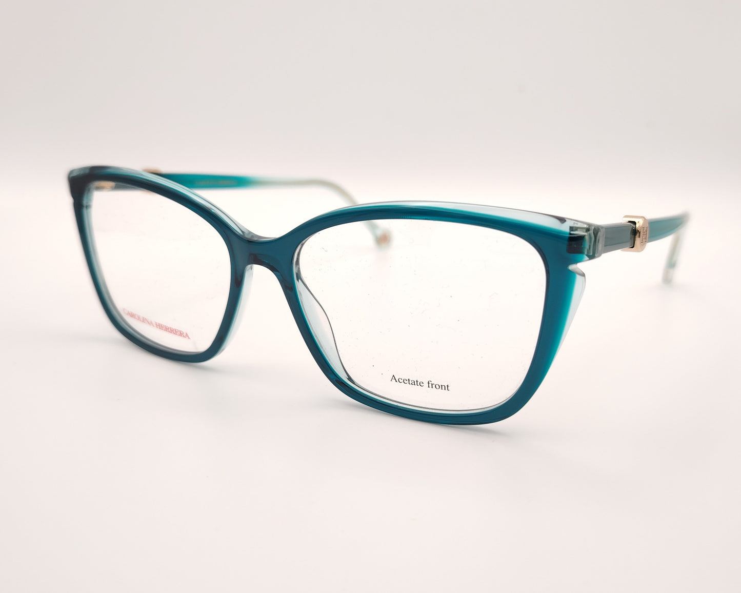 gafas graduadas carolina herrera azul petróleo translúcidas con forma cat eye  suave y detalle dorado
