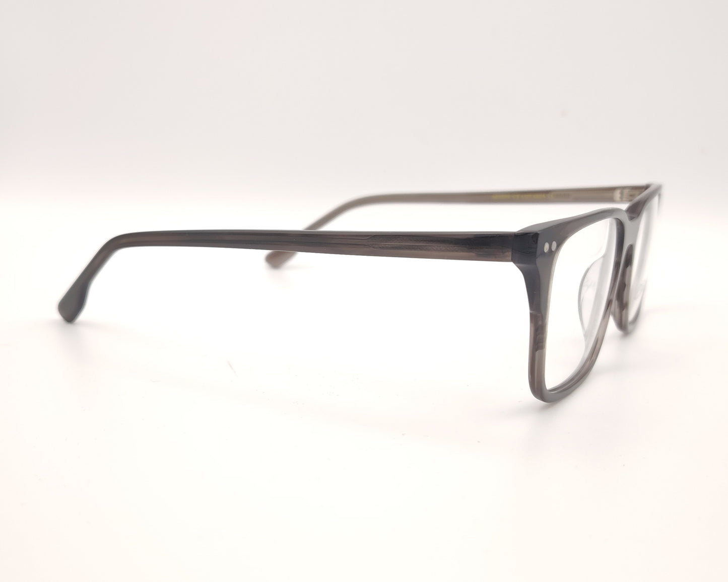 gafas graduadas rectangulares gris translúcido ligeras diseño moderno