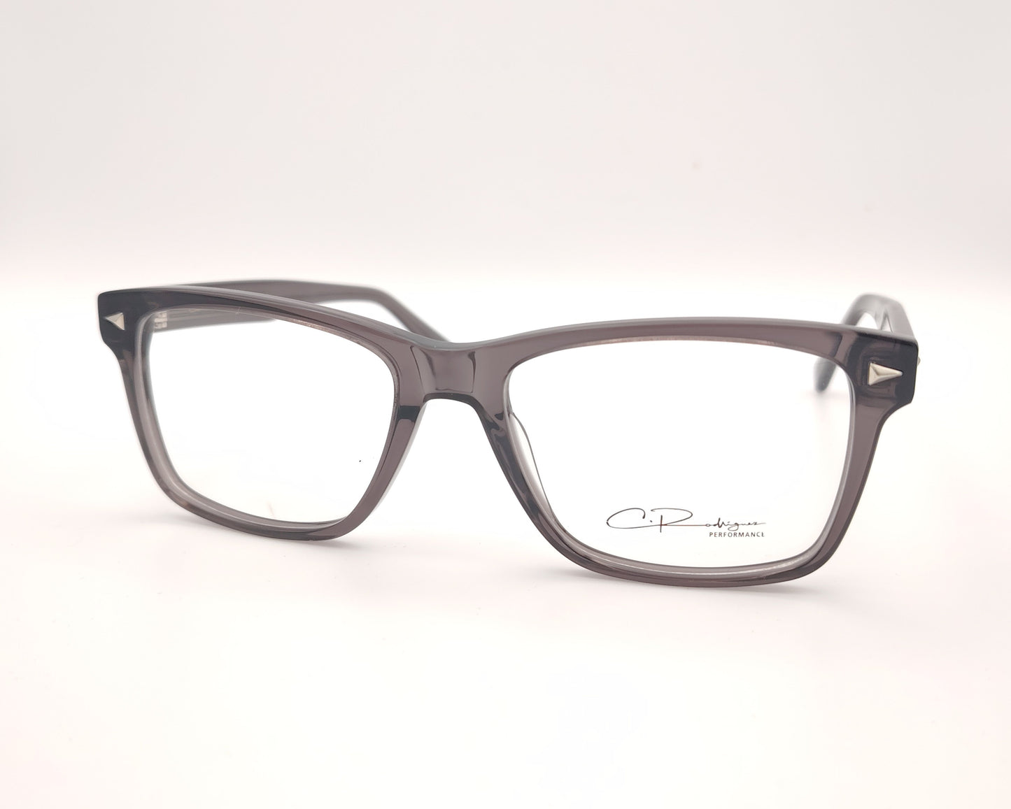 gafas graduadas rectangulares gris translúcido  de diseño moderno con detalles metálicos