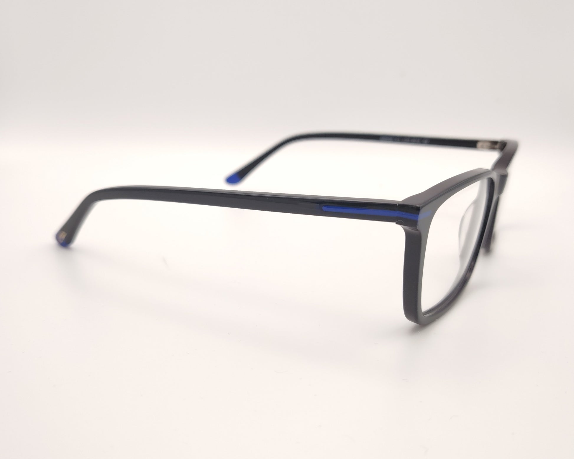 gafas graduadas negras rectangulares con detalles azules diseño moderno ligero
