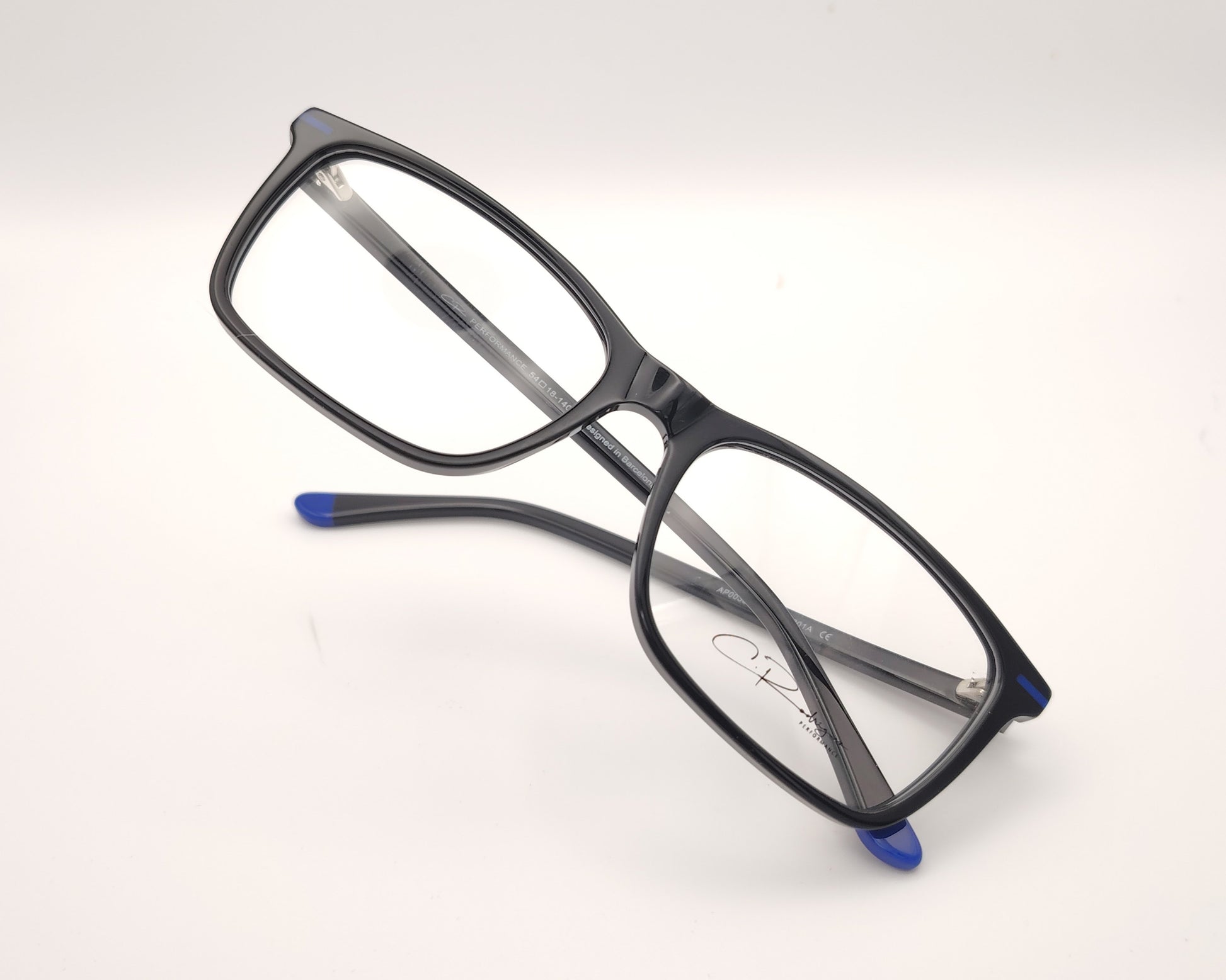 gafas graduadas negras rectangulares con detalles azules diseño moderno ligero