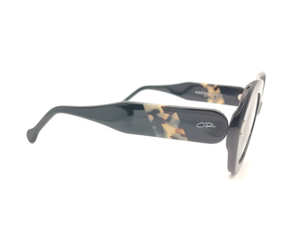 gafas de sol negras de acetato con lentes polarizadas negras y forma amplia