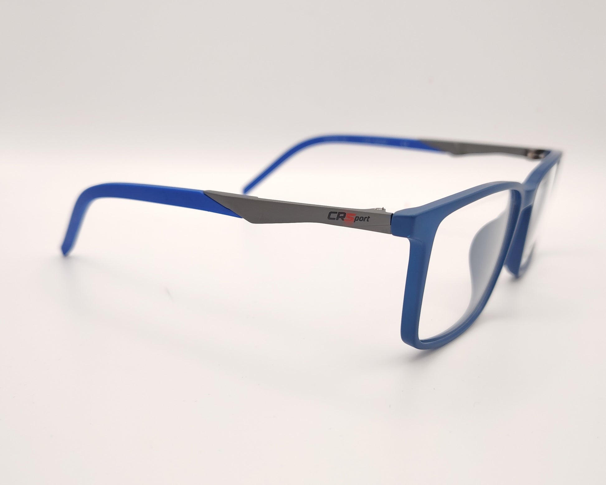 gafas graduadas rectangulares azul translúcido mate con varillas grises estilo deportivo
