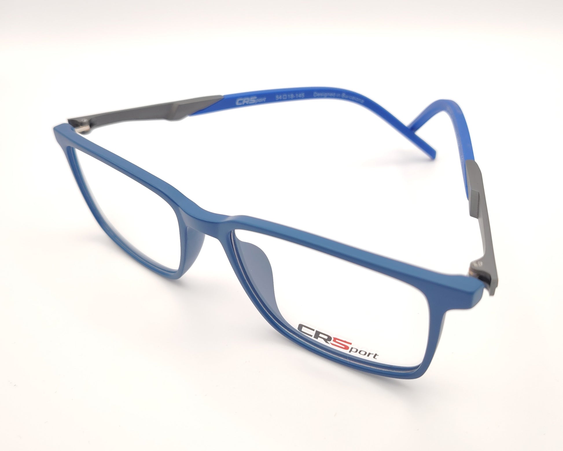 gafas graduadas rectangulares azul translúcido mate con varillas grises estilo deportivo