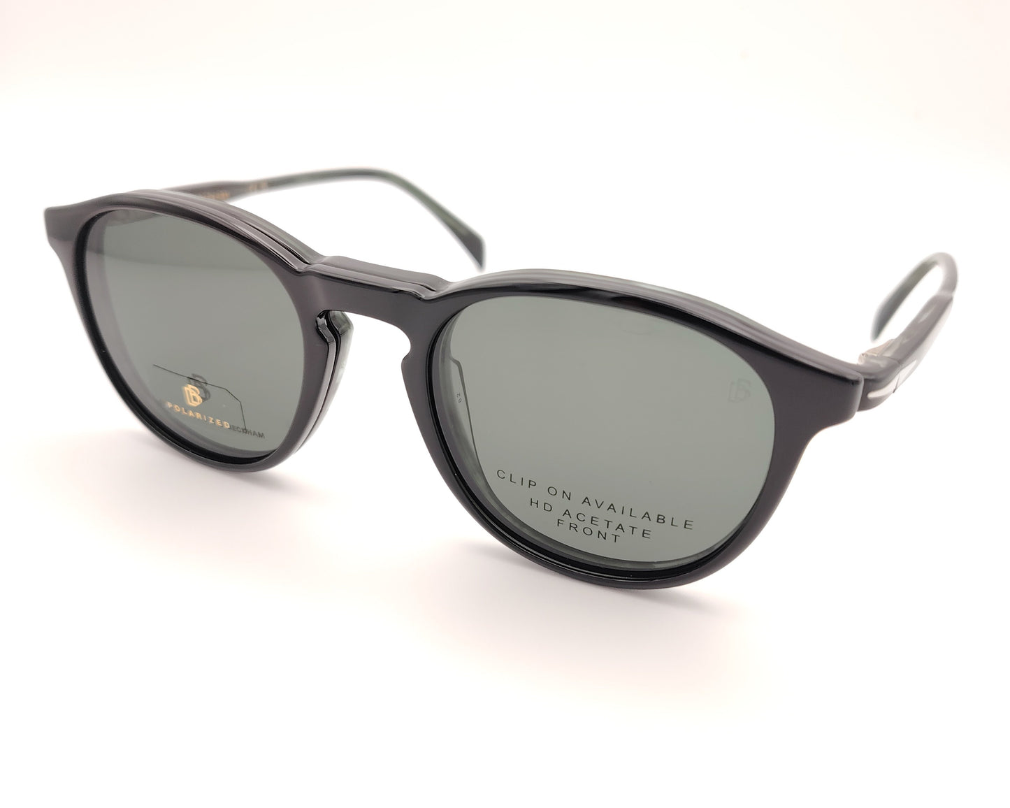 gafas graduadas de montura redondeada oscura con clip solar polarizado desmontable