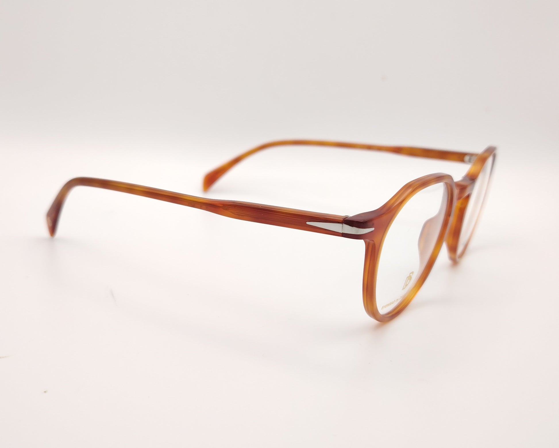 gafas graduadas redondas de acetato color miel con detalle metálico en las varillas