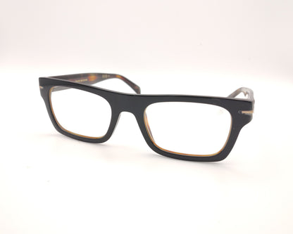 gafas rectangulares negras con clip solar magnético, lentes oscuras polarizadas y detalle interior carey