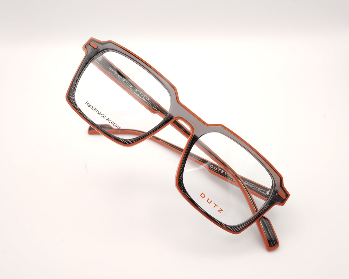 gafas graduadas dutz dz2373 de acetato naranja y gris translúcido con montura rectangular geométrica