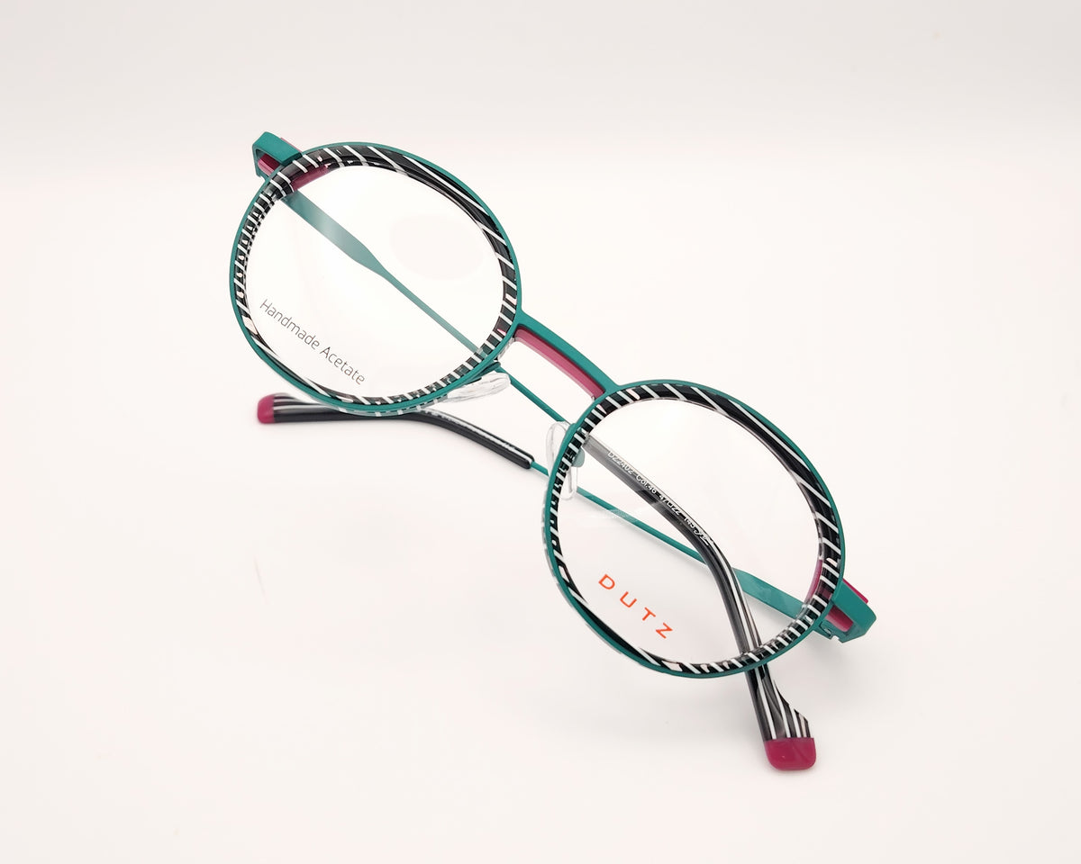 gafa dutz dz2402 46 redonda verde con estampado blanco y negro y detalles en fucsia