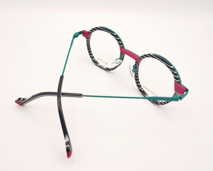 gafa dutz dz2402 46 redonda verde con estampado blanco y negro y detalles en fucsia