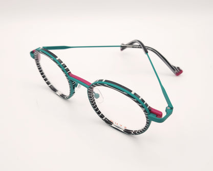 gafa dutz dz2402 46 redonda verde con estampado blanco y negro y detalles en fucsia