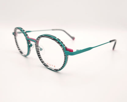 gafa dutz dz2402 46 redonda verde con estampado blanco y negro y detalles en fucsia