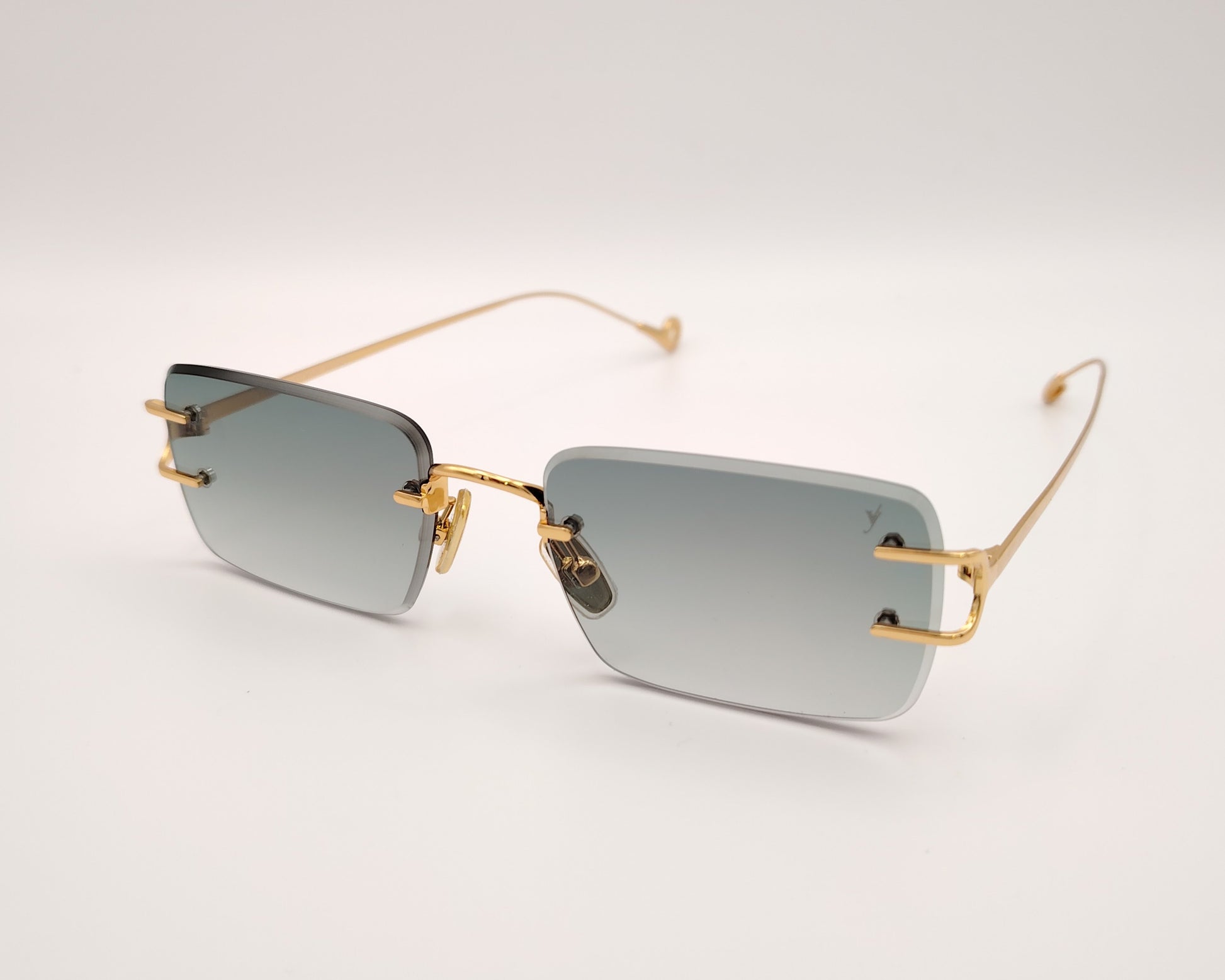 eyepetizer dillinger c 4-25 gafas de sol sin montura con lentes rectangulares degradadas en verde detalles metálicos dorados
