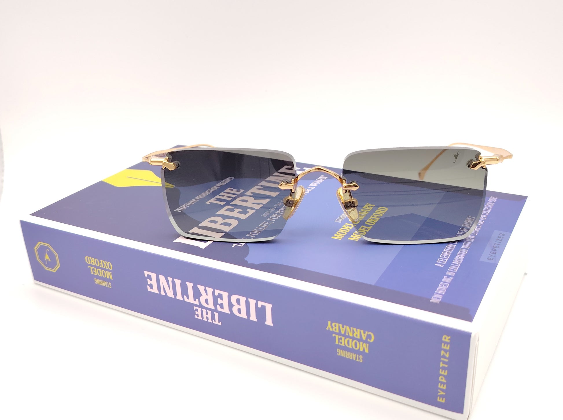 eyepetizer etherege c4-52 gafas de sol sin montura con lentes rectangulares degradadas en verde y detalles dorados