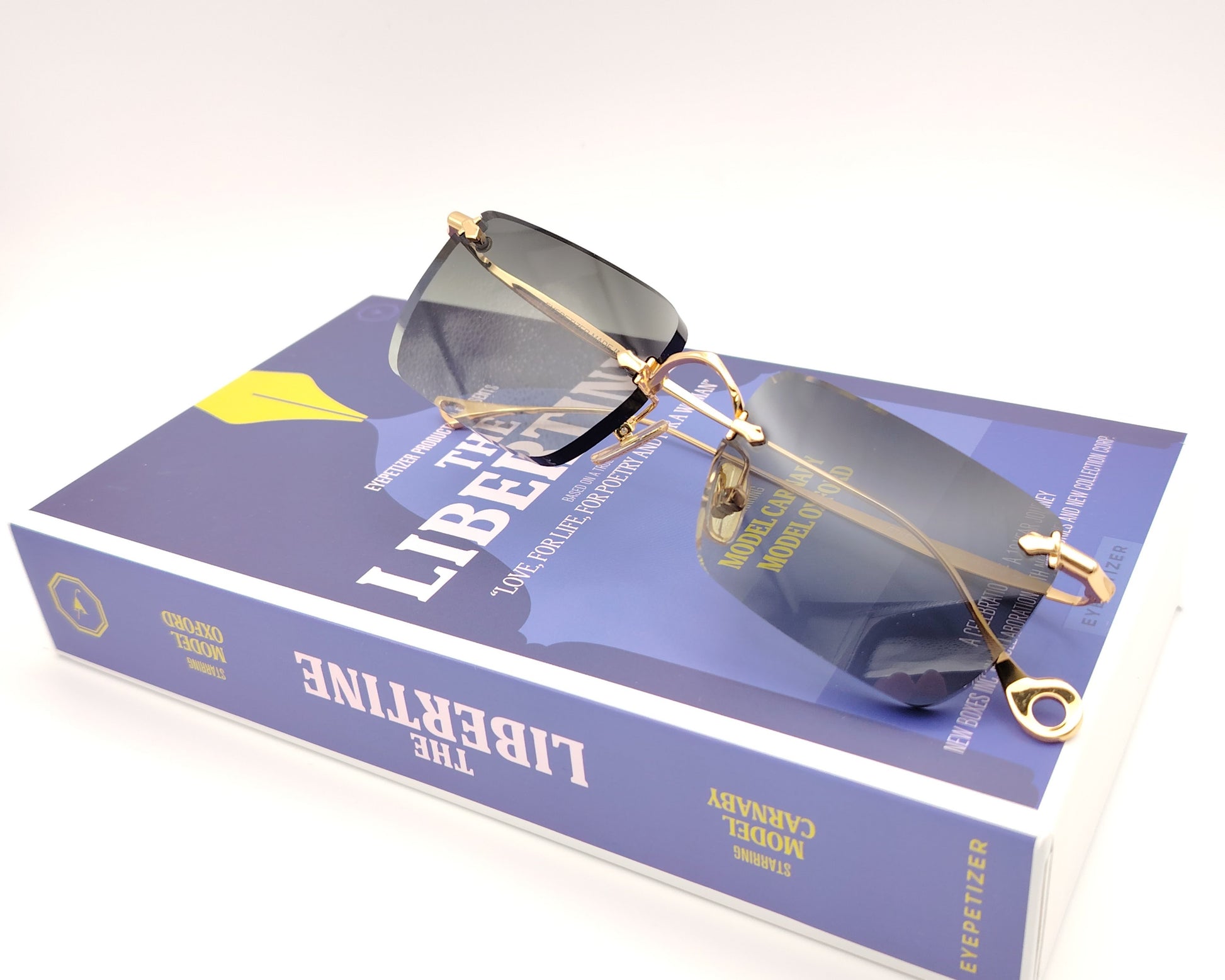 eyepetizer etherege c4-52 gafas de sol sin montura con lentes rectangulares degradadas en verde y detalles dorados