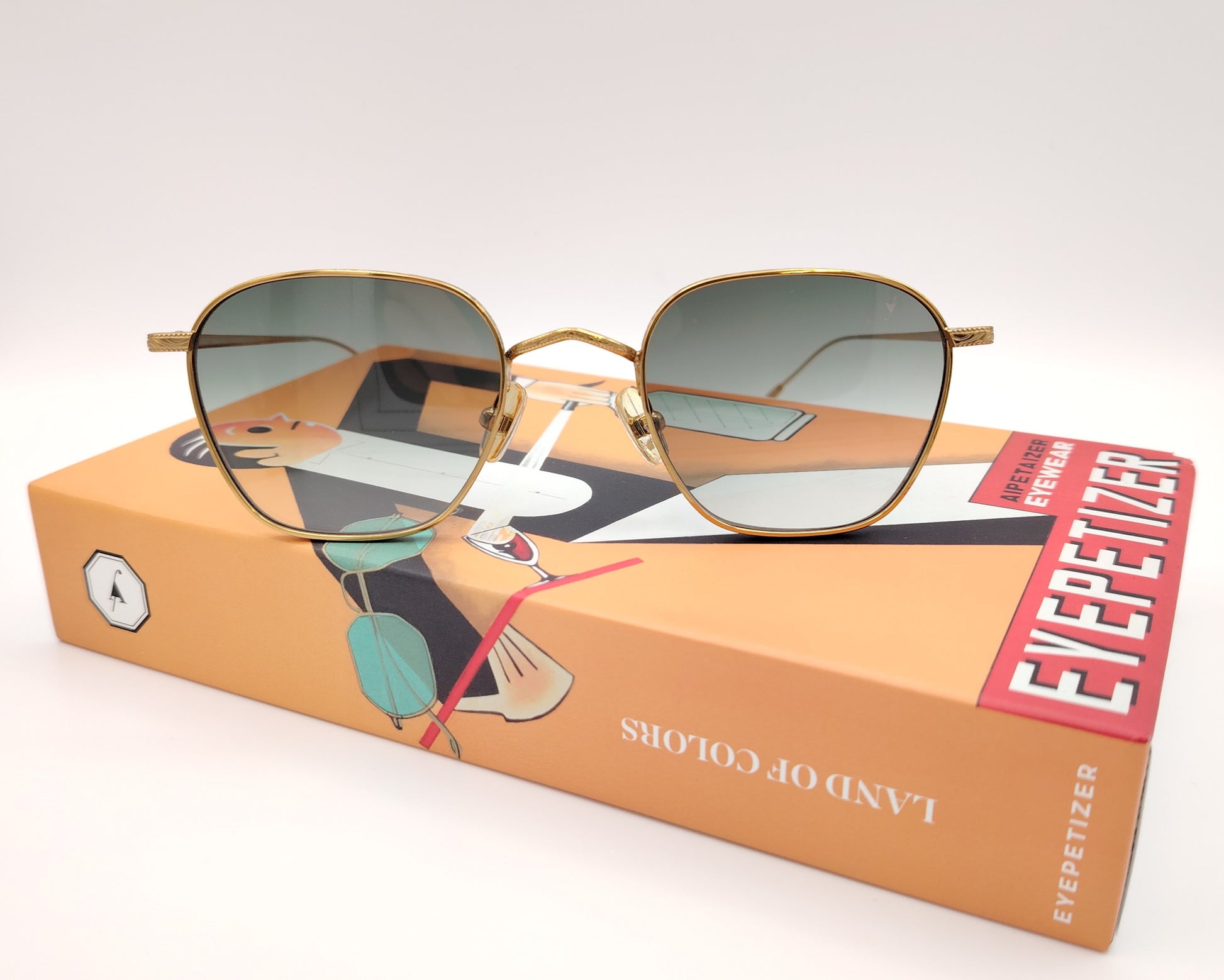 eyepetizer jondal c 4-25 gafas de sol metálicas en color dorado con lentes degradadas en tono verde diseño ligero y elegante