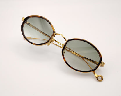 eyepetizer naomi c at-4-25 gafas de sol con montura combinada en metal dorado y acetato carey diseño ovalado con lentes verdes
