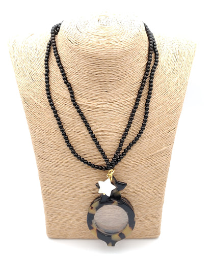 colgante lupa doble plegable con diseño carey y estrella blanca decorativa