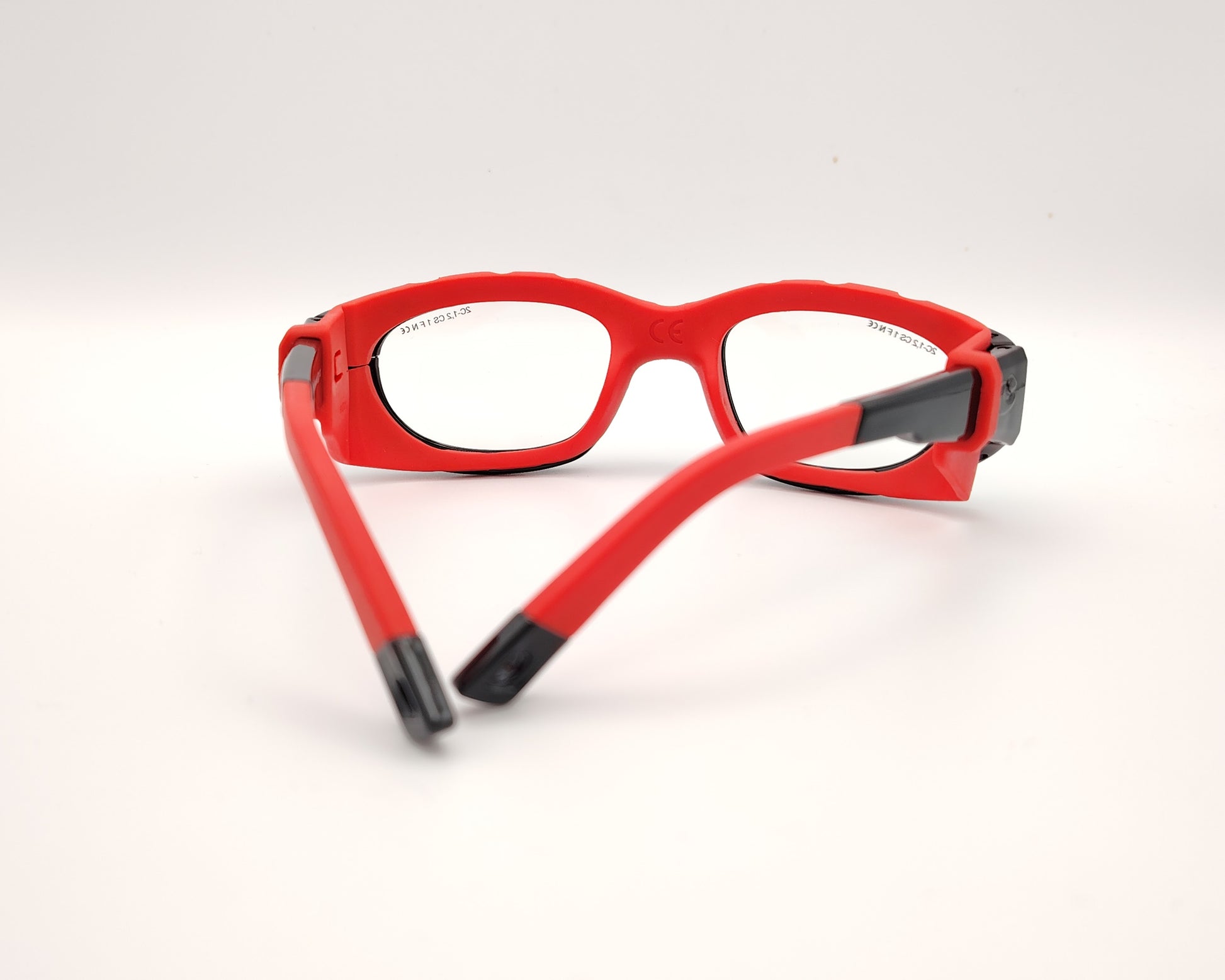 gafas de protección deportiva para niños con montura envolvente y cinta ajustable