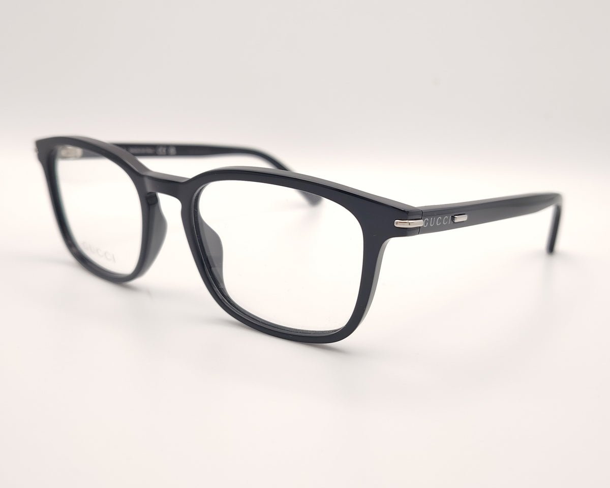 gafas gucci negras rectangulares con logo metálico en las varillas
