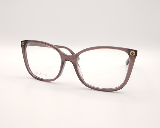 gafas gucci color malva con forma mariposa y detalles dorados