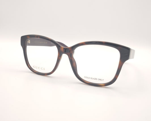 gafas graduadas gucci con frontal carey y patillas berenjena con logo dorado