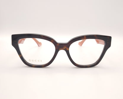 gafas gucci en acetato carey con varillas rosas y logo gg dorado