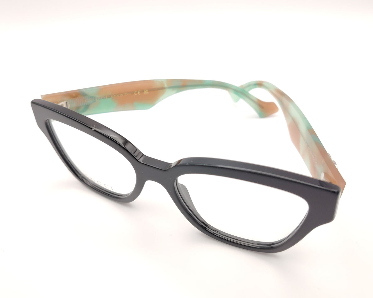 gafas gucci en acetato carey con varillas en verde y beige y logo gg plateado