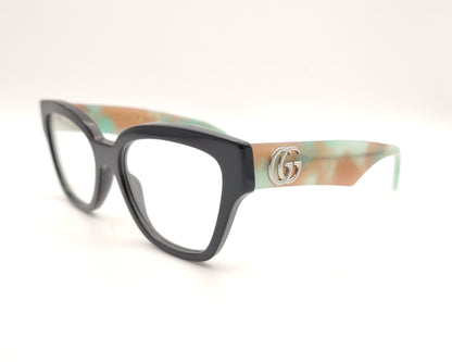 gafas gucci en acetato carey con varillas en verde y beige y logo gg plateado