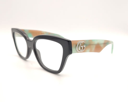 gafas gucci en acetato carey con varillas en verde y beige y logo gg plateado