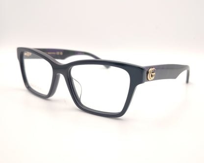 gafas gucci negras rectangulares con varilla jaspeada en verde y morado y logo dorado gg