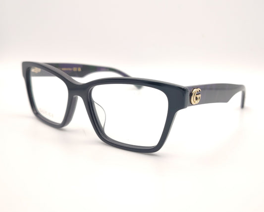 gafas gucci negras rectangulares con varilla jaspeada en verde y morado y logo dorado gg