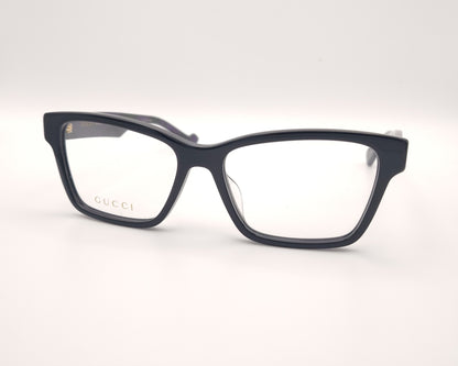 gafas gucci negras rectangulares con varilla jaspeada en verde y morado y logo dorado gg