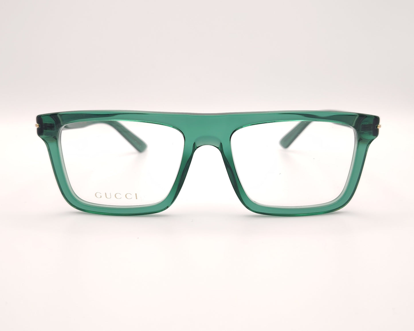 gafas graduadas gucci verdes con montura cuadrada y detalle dorado en la varilla