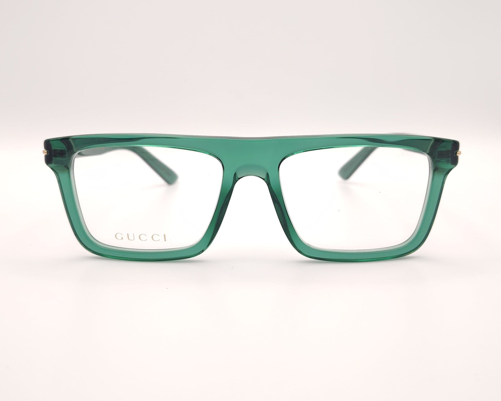gafas graduadas gucci verdes con montura cuadrada y detalle dorado en la varilla