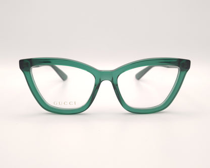 gafas gucci verdes translúcidas con forma cat eye 