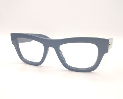 gafas graduadas gucci color azul grisáceo con montura gruesa y logo metálico en la varilla

