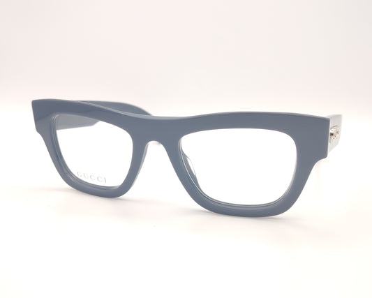 gafas graduadas gucci color azul grisáceo con montura gruesa y logo metálico en la varilla

