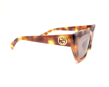 gafas de sol gucci cuadradas cat eyes carey con logo dorado en la varilla